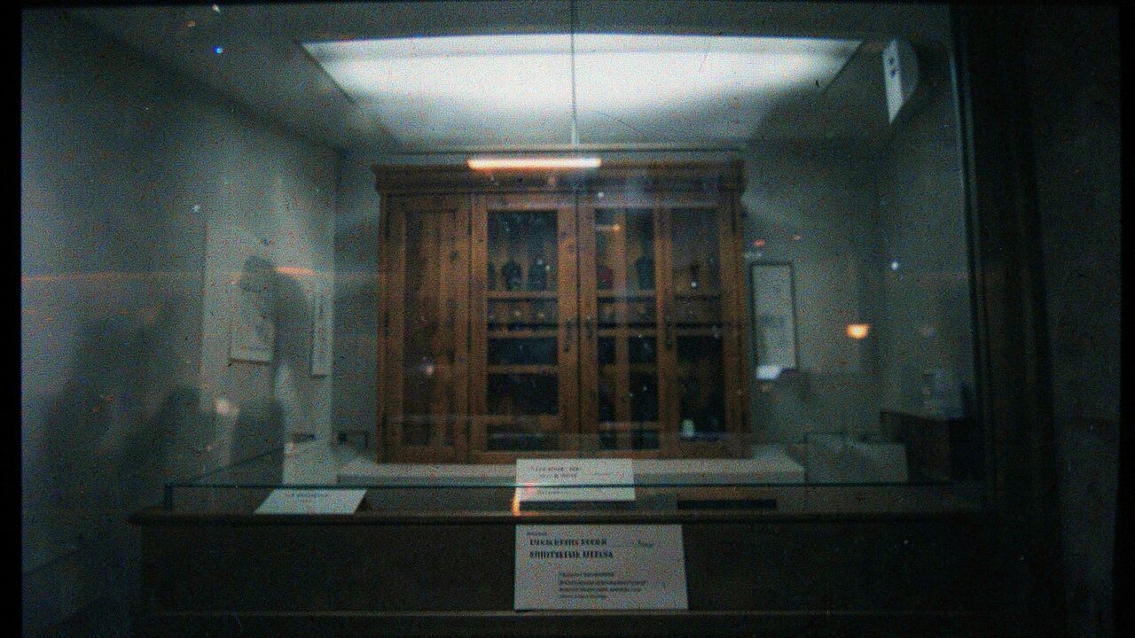 Sealed, placarded, behind glass. Nobody has opened it recently. Nobody seems to want to.