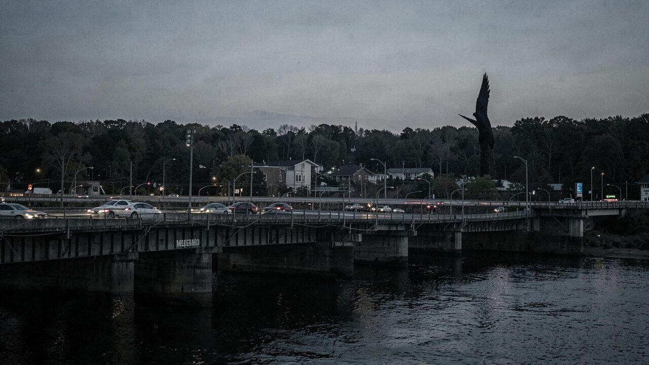 The Silver Memorial Bridge — different design, same river.