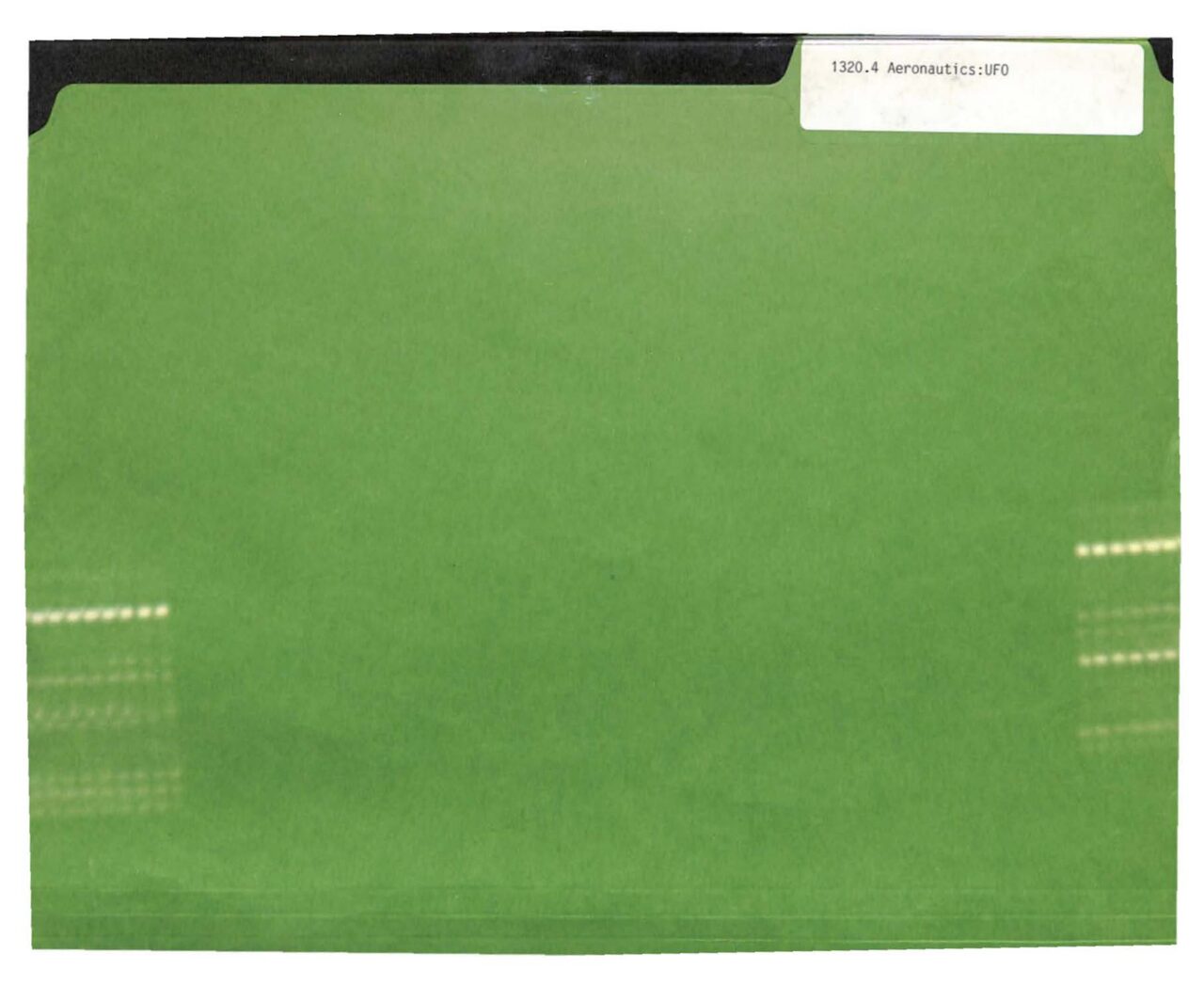 Credited in the archive only to "the United States Government": the scanned cover of a document folder, tab reading 1320.4 Aeronautics:UFO.